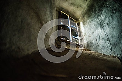 Mystical interior. Window in dark castle dungeon Stock Photo