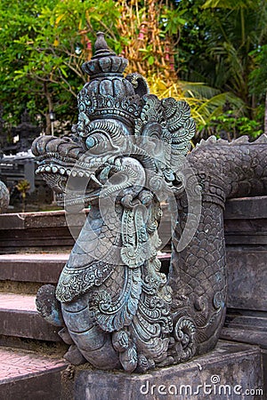 Mythological dragon sculpture in Bali Stock Photo