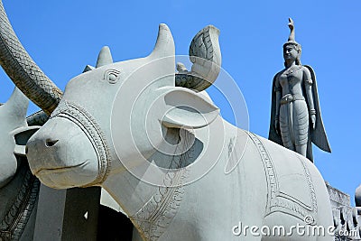 Mythological heavenly goddess rules a buffalo cart Stock Photo