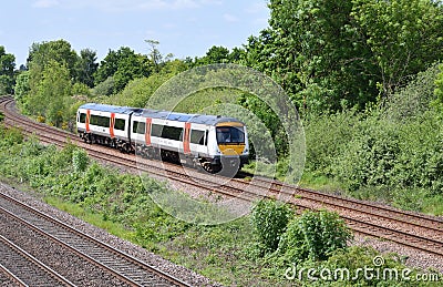 East Midlands Railway Turbostar 170271 rounds the curve at Findern with a Crewe to Newark Castle service on 26 May 2023 Editorial Stock Photo