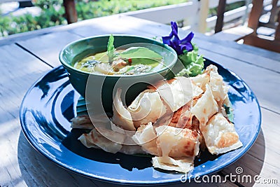 naan bread or roti with curry soup or green curry Stock Photo