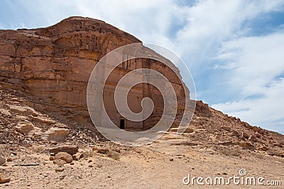 Nabatean tomb in MadaÃ®n Saleh archeological site, Saudi Arabia Stock Photo