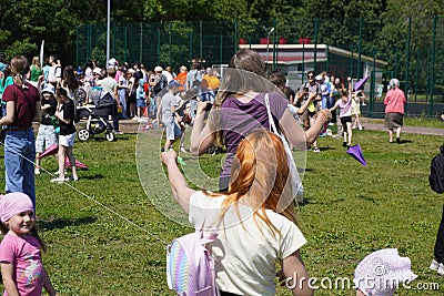 Naberezhnye Chelny, Russia - June 1, 2023 : People celebrate the holiday of summer and childhood in the park, children and adults Editorial Stock Photo