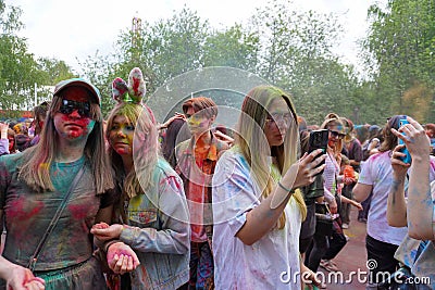 Naberezhnye Chelny, Russia - May 20, 2023 : Holi festival of colors, young people, guys and girls celebrate the beginning of Editorial Stock Photo