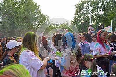 Naberezhnye Chelny, Russia - May 20, 2023 : Holi festival of colors, young people, guys and girls celebrate the beginning of Editorial Stock Photo