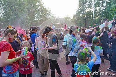 Naberezhnye Chelny, Russia - May 20, 2023 : Holi festival of colors, young people, guys and girls celebrate the beginning of Editorial Stock Photo