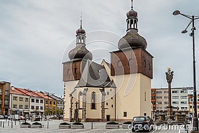 Nachod,Czech Republic- May 23,2021. City centre with Masaryk square,New Town Hall and medieval St. Lawrence`s Church with two bel Editorial Stock Photo