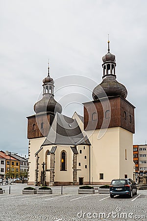 Nachod,Czech Republic- May 23,2021. City centre with Masaryk square,New Town Hall and medieval St. Lawrence`s Church with two bel Editorial Stock Photo