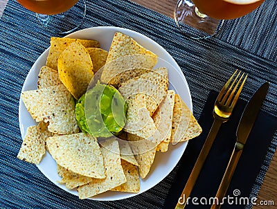 Nachos con guacamole. Corn chips. Stock Photo