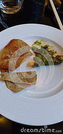 Nachos are my favorite appetizers. Love the chutney. Stock Photo