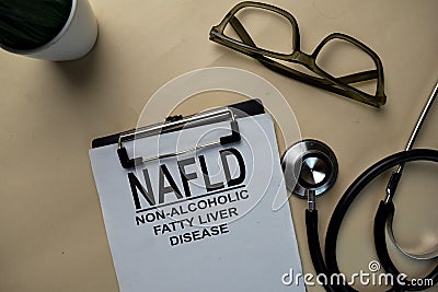 NAFLD - Non-Alcoholic Fatty Liver Disease write on a paperwork isolated on office desk Stock Photo