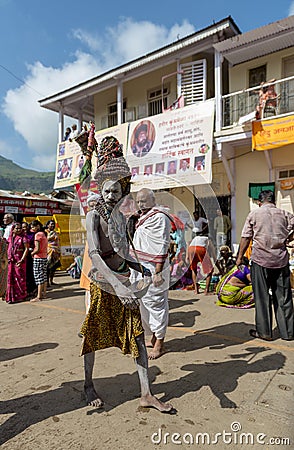 Naga Sadhu walking in streets,Nasik,Maharashtra,India Editorial Stock Photo