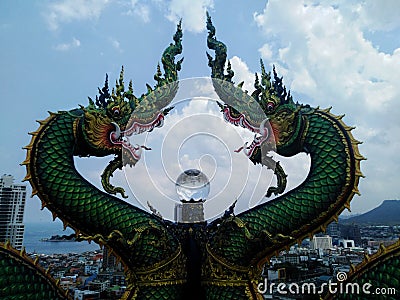 Naga statues and beautiful glass balls Stock Photo