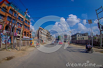 NAGARKOT, NEPAL OCTOBER 11, 2017: Close up of some people riding their motorbikes around the city in Nagarkot Nepal Editorial Stock Photo