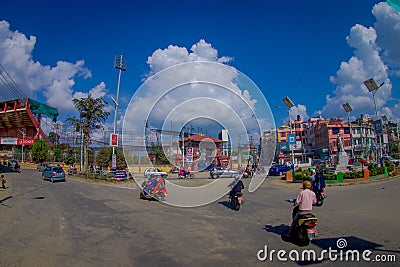 NAGARKOT, NEPAL OCTOBER 11, 2017: Close up of some people riding their motorbikes around the city in Nagarkot Nepal Editorial Stock Photo