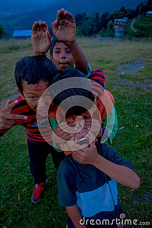 NAGARKOT, NEPAL OCTOBER 11, 2017: Unidentified group of playful little children playing and enjoying time with their Editorial Stock Photo