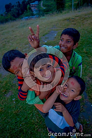 NAGARKOT, NEPAL OCTOBER 11, 2017: Unidentified group of playful little children playing and enjoying time with their Editorial Stock Photo