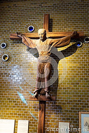 Twenty-Six Martyrs Christianity Museum inside view of a large holy cross on the wall with martyr crucified, Nagasaki, Japan Editorial Stock Photo