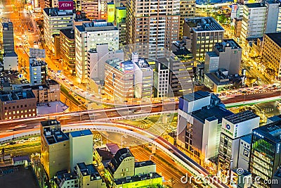 Nagoya cityscape in night time in telephoto zoom view. Editorial Stock Photo