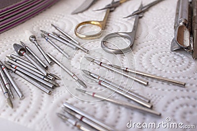 Nail accessories. Manicure tools. Metal objects for working with nails Stock Photo