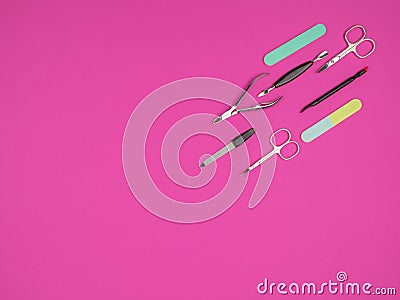 Nail accessories on a pink background Stock Photo