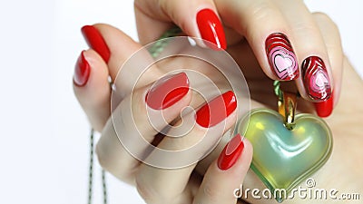 Nail art manicure with heart Stock Photo