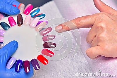 Nail Care And Manicure. Closeup Of Beautiful Female Hands Applyi Stock Photo