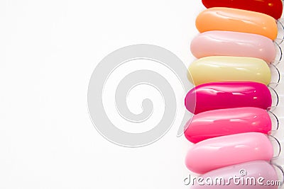 Nail Care And Manicure concept. Pink Multicolor Nail Polish palette for Client`s Nails choise. Woman In Beauty Salon. Copyspace Stock Photo