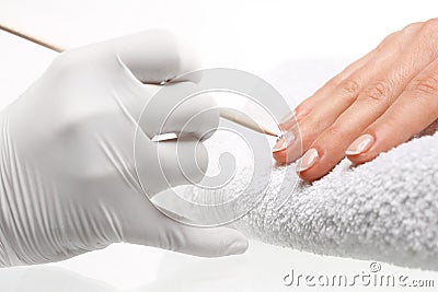 Nail decorating with Swarovski crystals Stock Photo