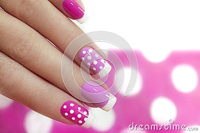 Nail design with white dots. Stock Photo