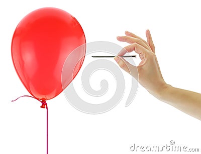 Nail about to pop a balloon Stock Photo