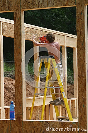 Nailing plywood Stock Photo