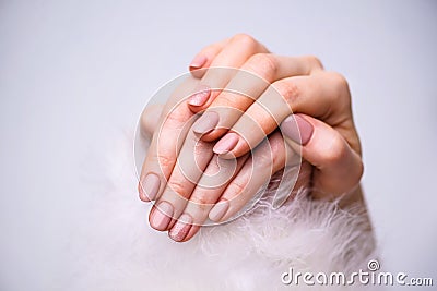 Nails Design. Hands With Bright Pink Spring Manicure On Grey Background. Close Up Of Female Hands. Art Nail Stock Photo