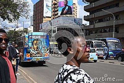 Street view with a painted buse on the busy streets of Nairobi, Kenya Editorial Stock Photo