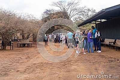 Nairobi, Kenya - March 17, 2023: Tourists wait in line at Sheldrick Wildlife Trust that raises orphaned elephants, to see the Editorial Stock Photo