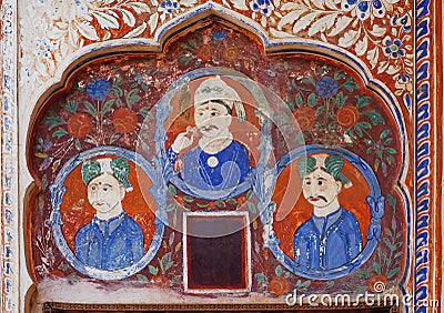 Naive fresco with three indian businessmen on background of historical wall of India Editorial Stock Photo