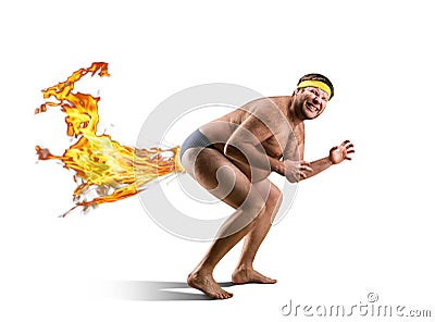 Naked freak by fire Stock Photo