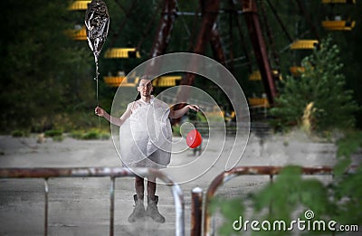 Freak man with balloon in the amusement park Stock Photo