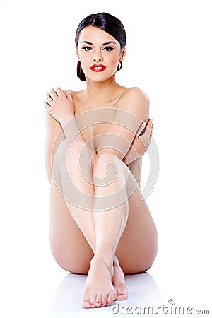 Naked Young Pretty Woman Sitting on Floor Stock Photo