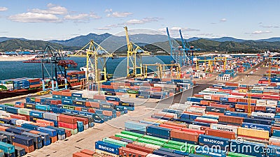 Nakhodka, Russia-August 2019: container terminals in Nakhodka port. port Nakhodka in Russia, coal, oil, containers, wood Editorial Stock Photo