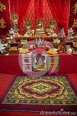 Set of Chinese altar table on the street in city during the Chinese New year celebrations. Editorial Stock Photo