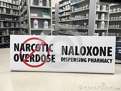 Naloxone sign on counter Stock Photo