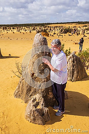 NAMBUNG, WESTERN AUSTRALIA, AUSTRALIA - SEP 9 2019: Australian and International tourist flock to the Pinnacles Desert to admire Editorial Stock Photo