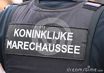 Name badge of the Koninklijke Marechaussee on bullet proof protection in the Netherlands Editorial Stock Photo