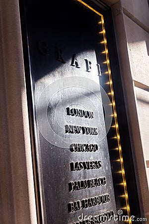 Name of the cities graven on entrance of the hotel in London Editorial Stock Photo