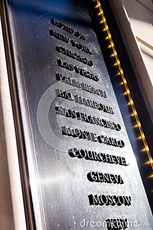 Name of the cities graven on entrance of the hotel in London Editorial Stock Photo