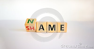 Name or shame symbol. Turned the cube and changed cube and changes the word `shame` to `name` or vice versa. Beautiful white Stock Photo