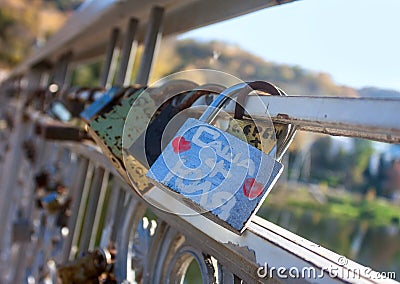 Names on the padlocks as a proof of love Stock Photo