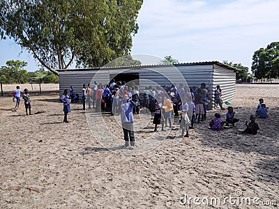 NAMIBIA, Kavango, OCTOBER 15: Namibian school children waiting for a lunch. Kavango was the region with the Highest povert Editorial Stock Photo