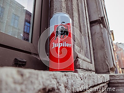 Can of Jupiler lager beer abandoned on a window sill outside Editorial Stock Photo